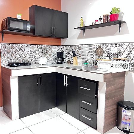 Oxalis Aeropuerto Apartment Alajuela Luaran gambar
